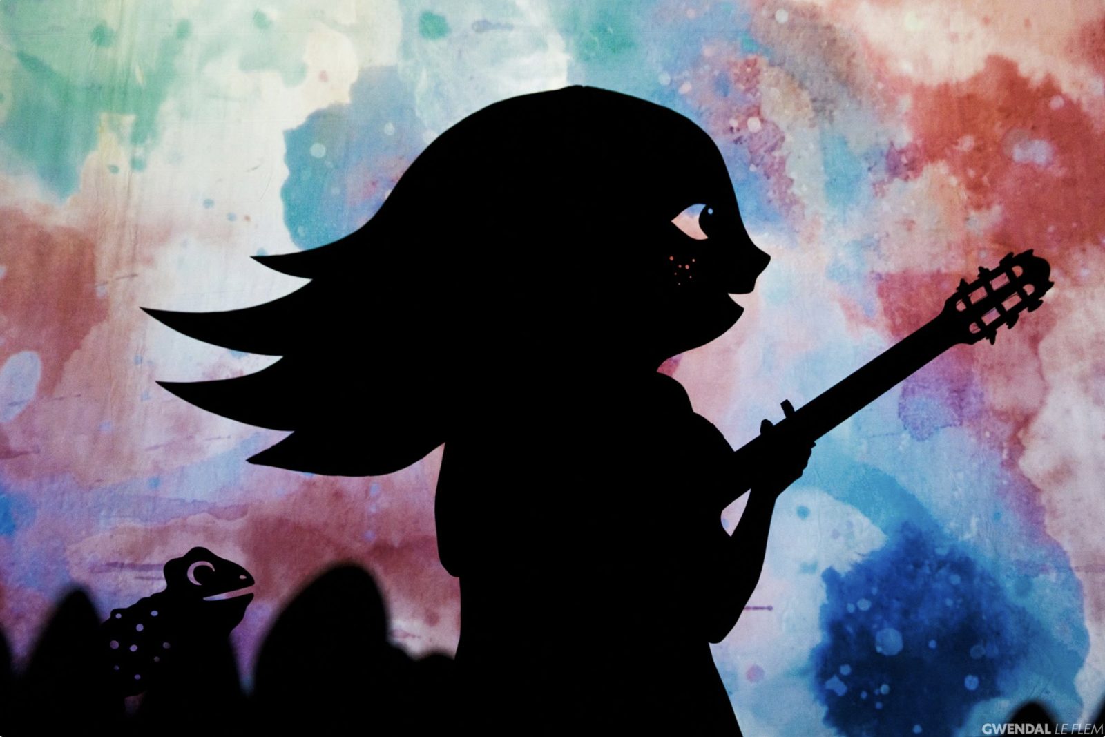 Affiche des Graines Oubliées : silhouette à la guitare en théâtre d'ombres